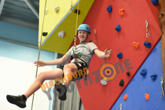 Senior member enjoying rock climbing